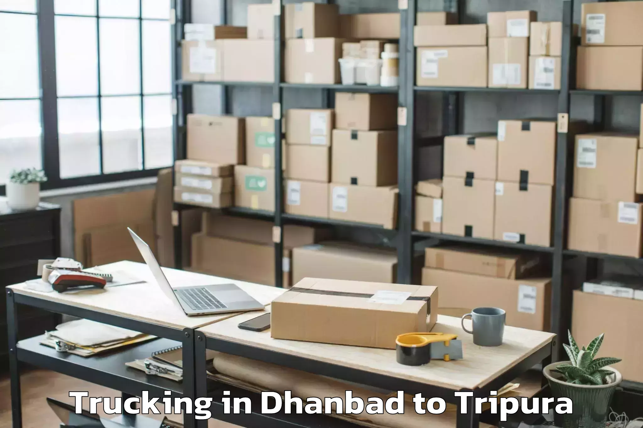 Top Dhanbad to Kailashahar Airport Ixh Trucking Available